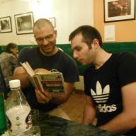 Bryan Teaching Adam About the History of India at Cafe Turtle