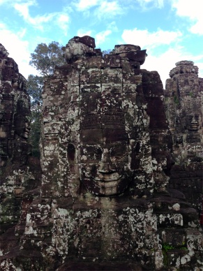 This temple has 37 towers, most of which have at least 4 faces carved on them facing all 4 directions.